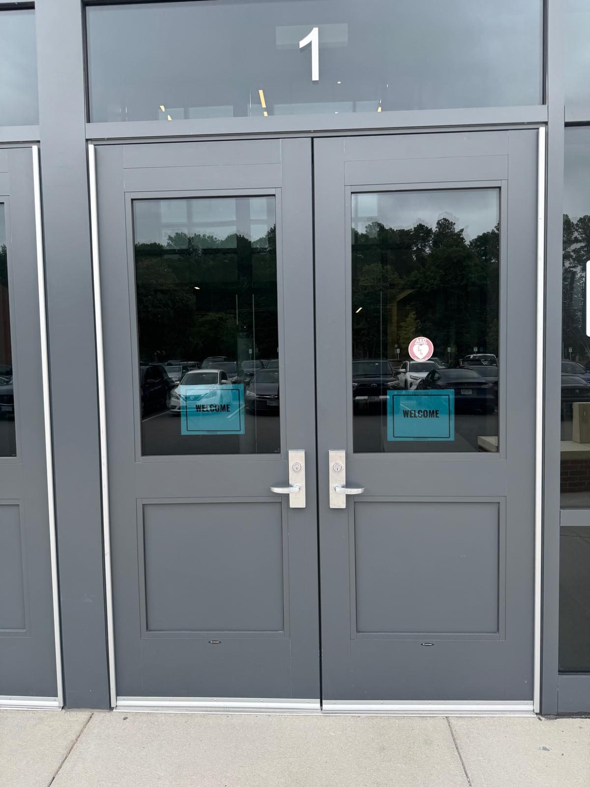 Storefront entry doors with new lever hardware
